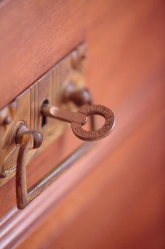 a metal door with a key on it at Agriturismo Spazzavento in Vinci