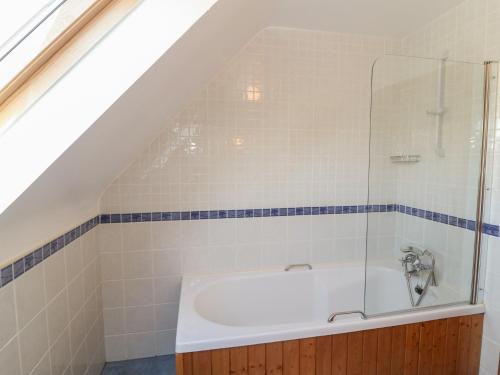 a bathroom with a sink and a shower at The Skating Rock in Banane Bridge
