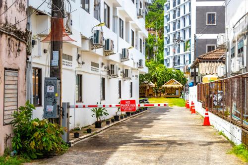 a street in a city with white buildings at Patong Canal Villa 308 in Patong Beach