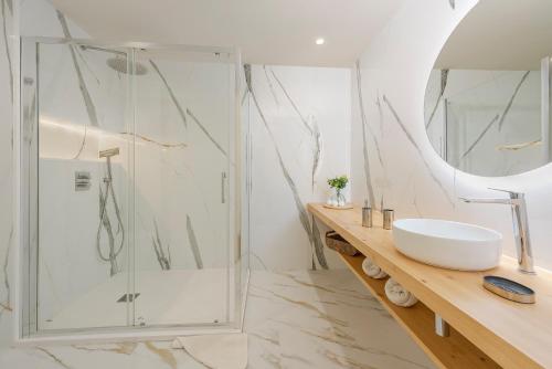 a bathroom with a shower and a sink at Apartment Vistamar IV in Port de Pollensa