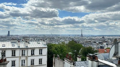Eiffel Tower View from the Top Floor | Montmartre