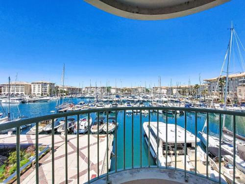 a view of a marina with boats in the water at Apartment Résidence Les Cariatides by Interhome in Fréjus