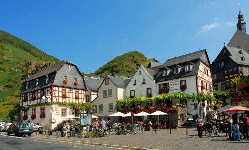 a group of buildings on a street in a town at Villa Beilstein in Beilstein