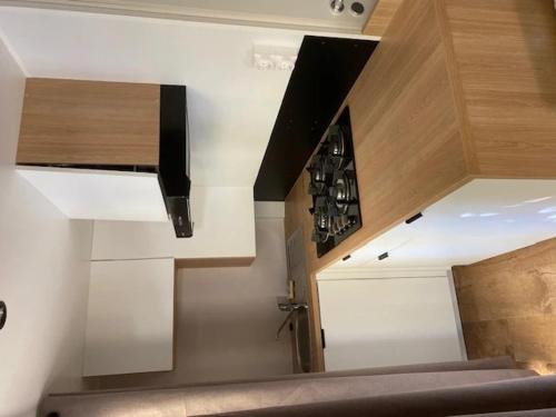 a room with a stairway with a wine cellar at Camping 2 étoiles - Piscine - ccbfiif in Avignon