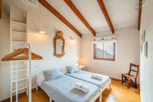 a bedroom with two beds and a bunk bed at Cubo's Villa La Gitanilla in Mijas