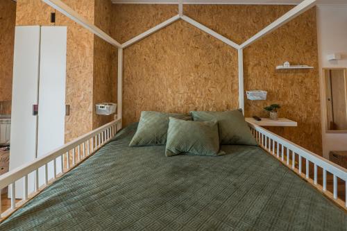 a room with a bed in the corner of a room at Cantinho do Cávado in Fão