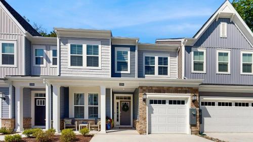 a house with a white at Milos Haven house with community pool in Frankford