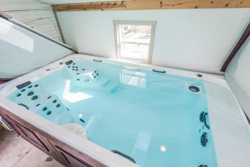 a jacuzzi tub in a tiny house at 72 S Orem Upstairs Only in Orem