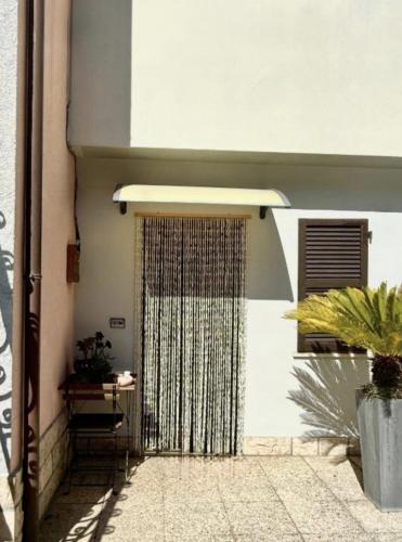 a front door of a building with a gate at Da Claudio e Ivana in Camerano