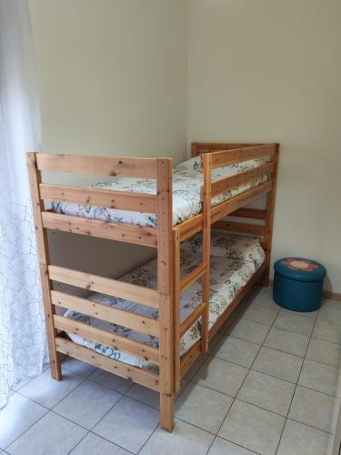a pair of bunk beds in a room at Casa Cesano mare in Senigallia