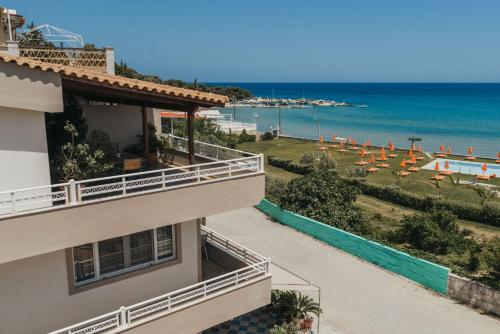 a view of the beach from the balcony of a hotel at Level 3 Sea View Studio in Planos