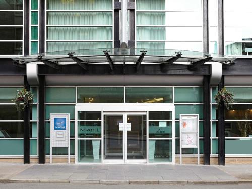 an entrance to a building with a glass door at Novotel Glasgow Centre in Glasgow