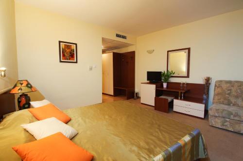 Postel nebo postele na pokoji v ubytování Hotel Veris