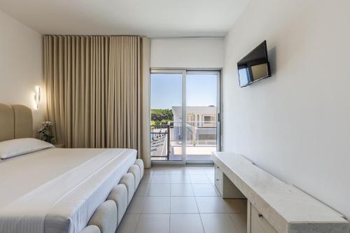 Intea Hotel Durres tesisinde bir odada yatak veya yataklar