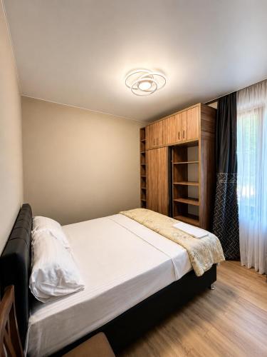 a bedroom with a large bed in a room at phranta in Gonio