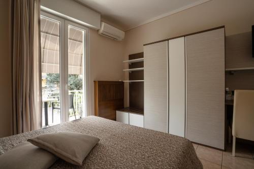 Postelja oz. postelje v sobi nastanitve Hotel Campanello