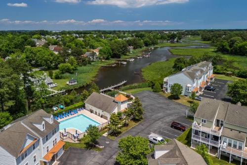 an aerial view of a resort with a river and houses at 11 Mooring La in Millville