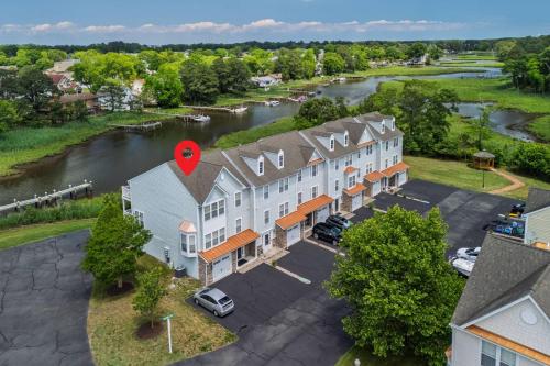 an aerial view of a building with a river at 11 Mooring La in Millville