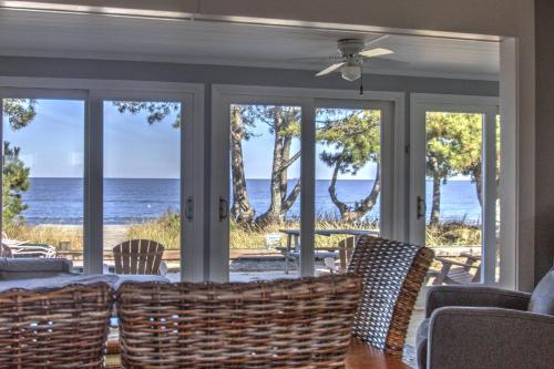 a dining room with a view of the ocean at 229 Bay Ave. in Milford