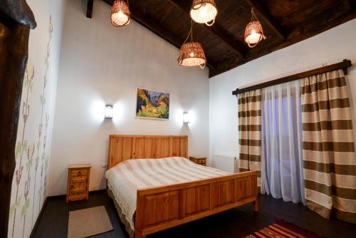 Postel nebo postele na pokoji v ubytování Hotel Skrinya