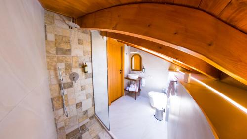 an overhead view of a bathroom with a sink and a toilet at Sokak Boutique Hotel in Berat