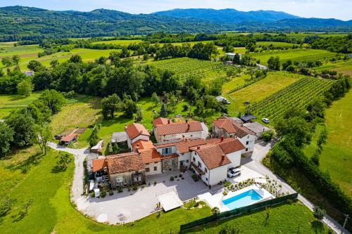 an aerial view of a large estate with a swimming pool at Vila Dobra in Dobravlje