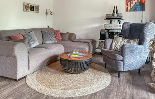a living room with a couch and two chairs and a table at Amazing Home In Meschede With Wifi in Meschede