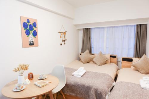 JR Shin-Osaka 1 min Airport direct Namba Umeda USJ direct 2 beds 3 people Wet and dry separation and kitchen