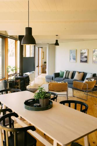 a living room with a table and chairs at The Angle House - Aireys Inlet in Aireys Inlet