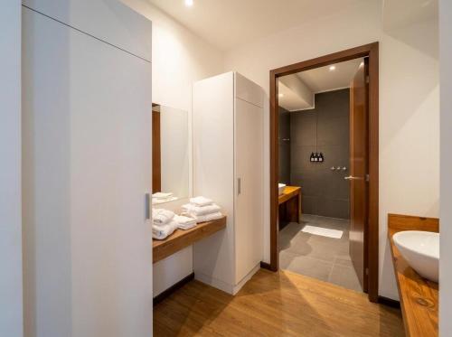 a bathroom with a sink and a toilet at Posada del Blanco in Potrerillos