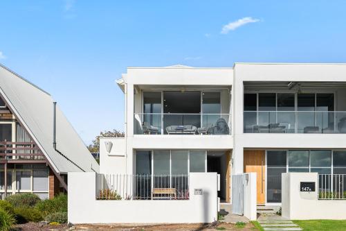 an image of a white house at Meander - Port Noarlunga South - C21 SouthCoast Holidays in Port Noarlunga South