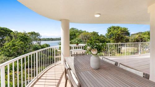 a porch with a vase sitting on top of it at The Entrance Unit 5 in Kawana Waters