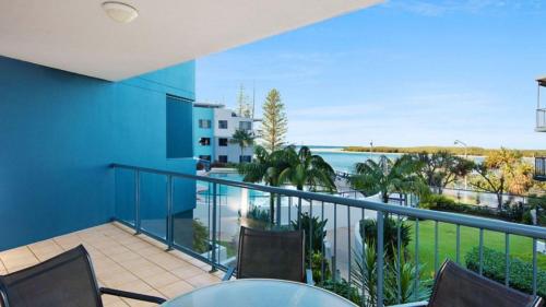 a balcony with chairs and a view of the ocean at Grand Pacific Unit 19 in Caloundra