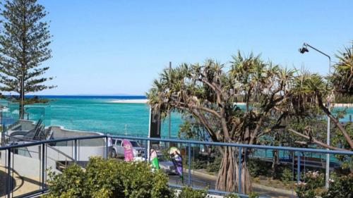 a view of the ocean from the balcony of a resort at Grand Pacific Unit 10 in Caloundra