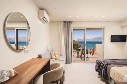 a hotel room with a view of the ocean at Sal hotel Kissamos in Kissamos