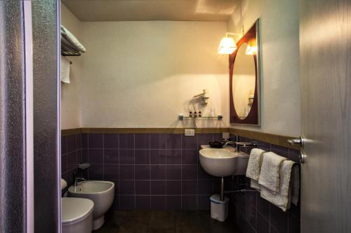 Kylpyhuone majoituspaikassa Hotel O'scià