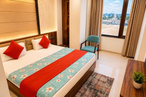 a hotel room with a bed and a window at Hotel The Royal Barbariq in Khātu