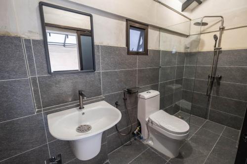 a bathroom with a sink and a toilet at Hillcrest Dawn, Bentong in Bentong