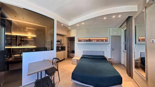 a room with a bed in the middle of a room at Tornola Luxury Rooms in Termoli