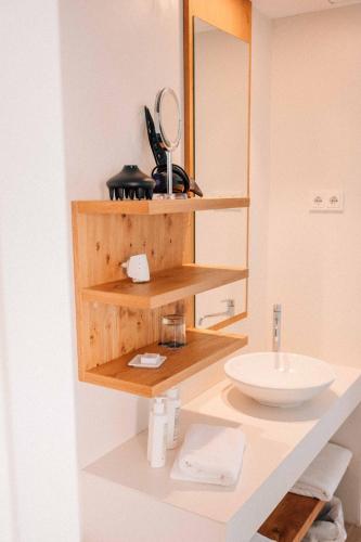 a bathroom with a sink and a mirror at Can Jaume Private Villas by Ocean Drive in Ibiza Town