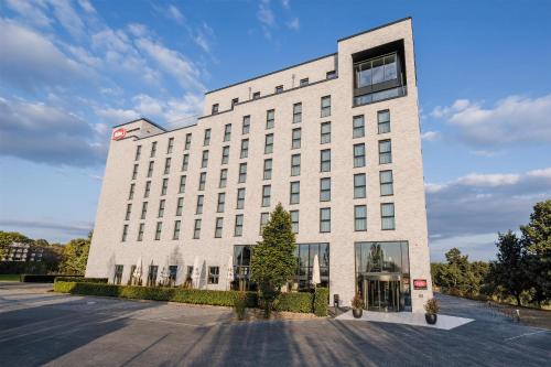 a large white building with a lot of windows at Aiden by Best Western Velbert in Velbert