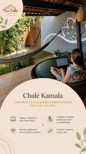 a little girl sitting in a chair with a laptop at Chalé Kamala com quintal - Perfeito para Nômades Digitais in Pipa