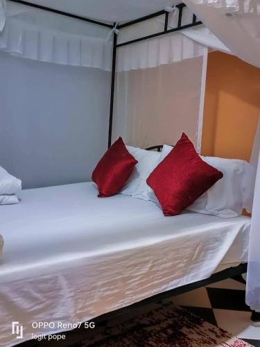 Llit o llits en una habitació de Dignitaries hotel