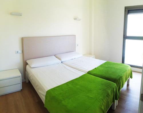 Posteľ alebo postele v izbe v ubytovaní Apartamento Adrover