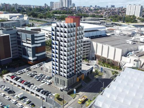 an overhead view of a city with a tall building at Ibis Budget Salvador in Salvador