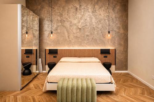 a bedroom with a king sized bed and a couch at Donna Teresa Amalficoast in Cetara
