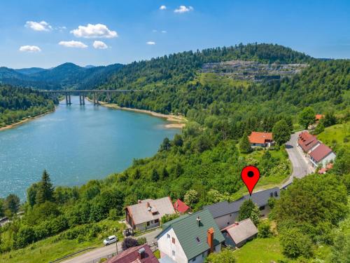 a view of a river with a red marker at Villa Orso by Interhome in Fužine