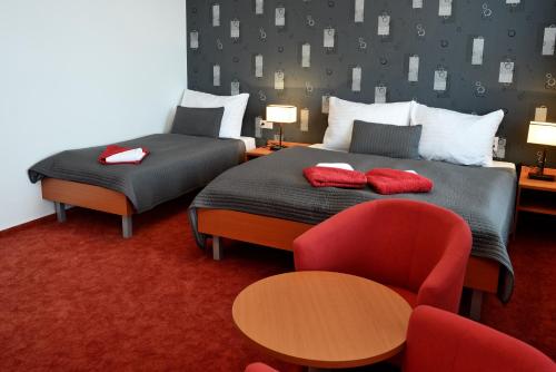 Postel nebo postele na pokoji v ubytování Hotel Limba CTT