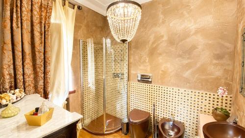 a bathroom with a shower and a sink at The Queens House in Agrigento