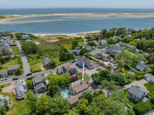 an aerial view of a neighborhood with houses and the beach at Sand Simeon - Relax, Unwind, Repeat in Chatham